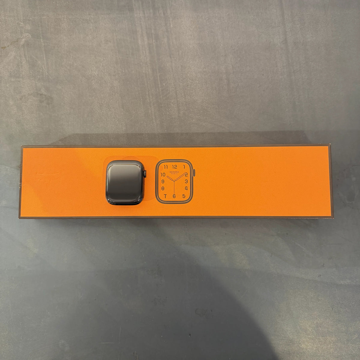 Apple Watch Hèrmes Series 7 GPS + Cellular, 45 mm Edelstahlgehäuse, Space Schwarz, individuelles Armband, used kaufen